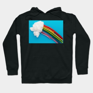 Photo illustration depicting clouds and a rainbow Hoodie